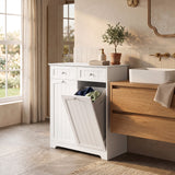Laundry cabinet with tilt-out hamper and drawers