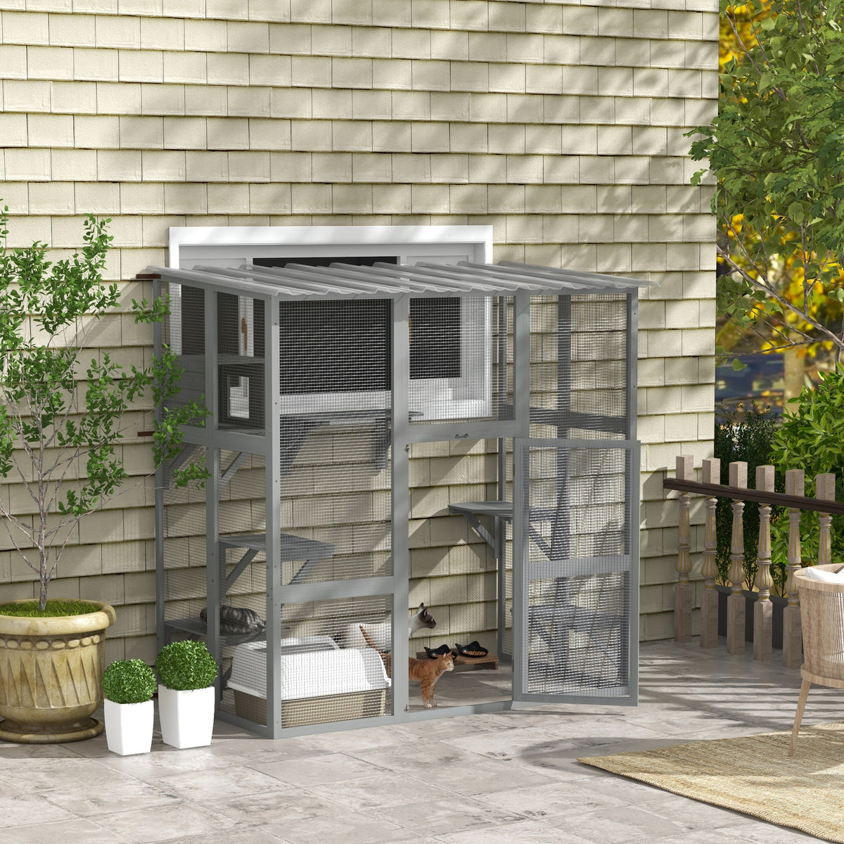 Multi-level outdoor cat enclosure with transparent roof