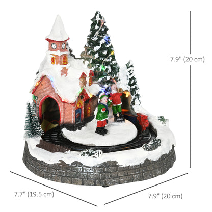 Decoración de pueblo navideño con tren giratorio y música