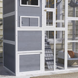 Outdoor wooden cat enclosure with condo and hammock
