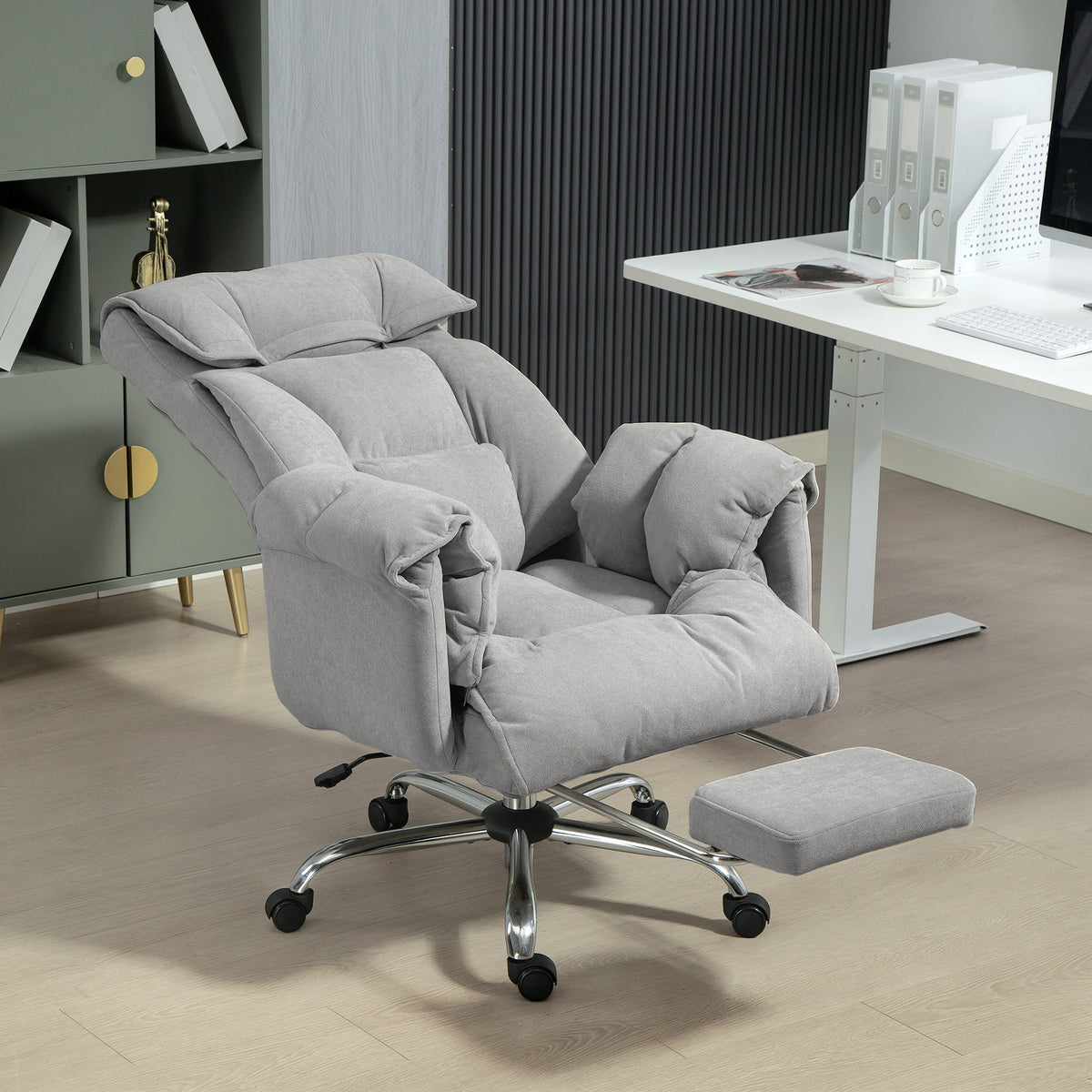 Silla de oficina ergonómica reclinable con reposapiés