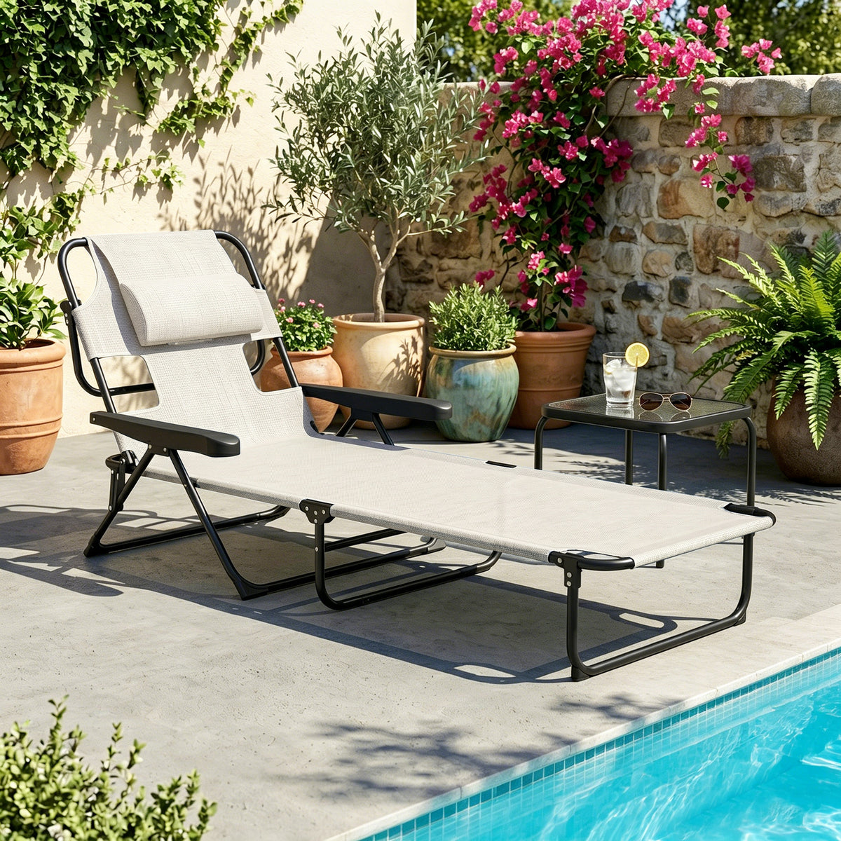 Folding lounge chair with reclining backrest