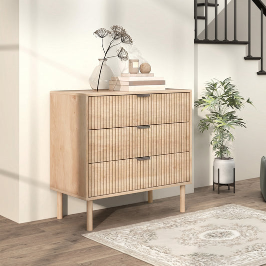Cómoda de 3 cajones con paneles acanalados y patas de madera