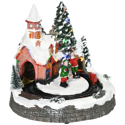 Decoración de pueblo navideño con tren giratorio y música
