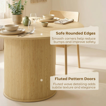 Mesa de comedor redonda con base acanalada