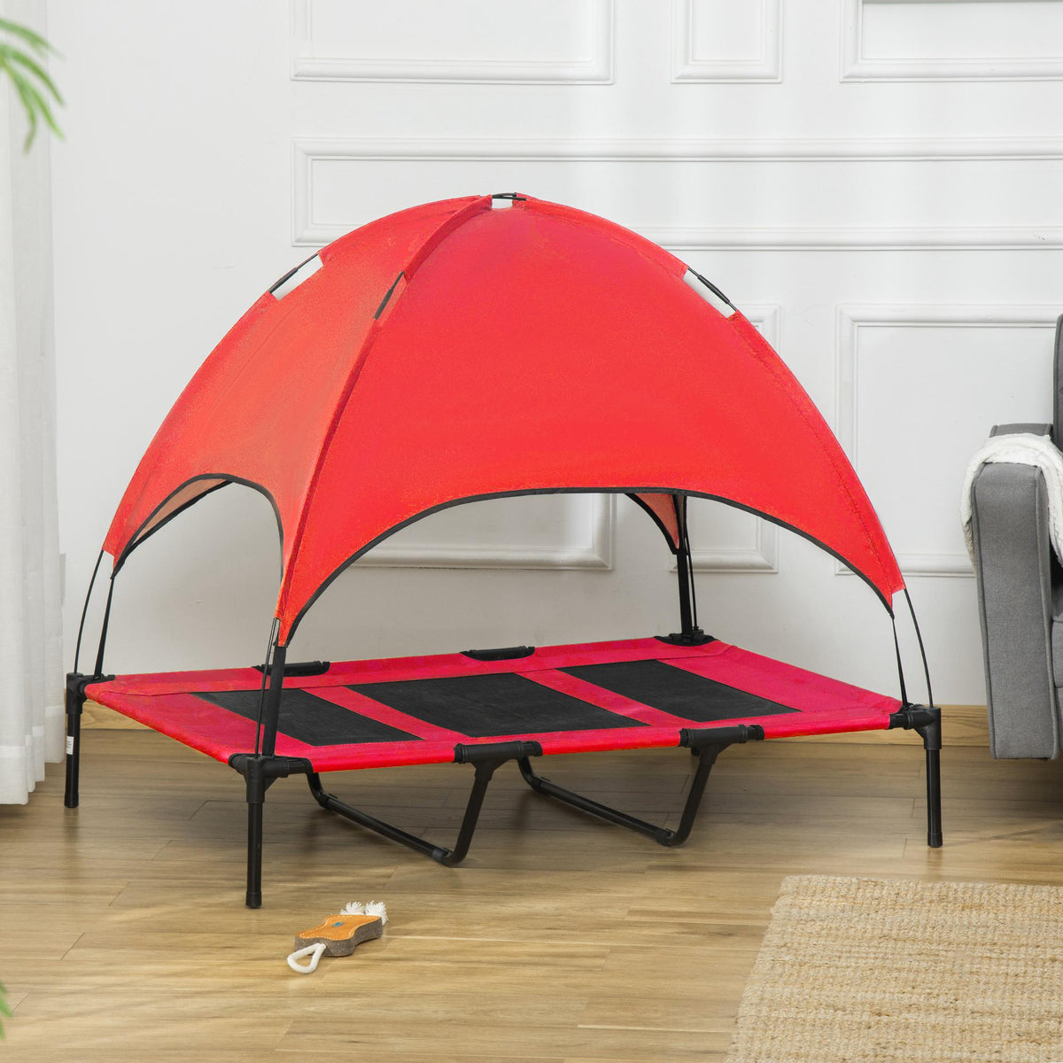 Elevated dog bed with canopy