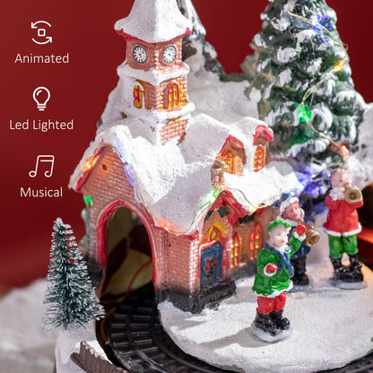 Decoración de pueblo navideño con tren giratorio y música
