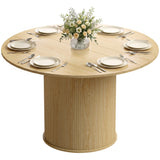 Mesa de comedor redonda con base acanalada