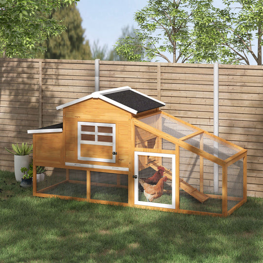 Wooden outdoor chicken coop with run and nesting box