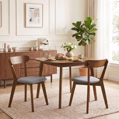 Sillas de comedor tapizadas en lino gris