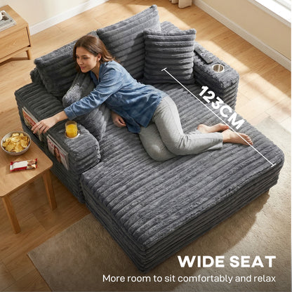 Sofá cama de gran confort con soporte para bebidas y cojines