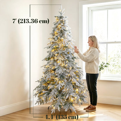 Árbol de Navidad artificial iluminado y nevado